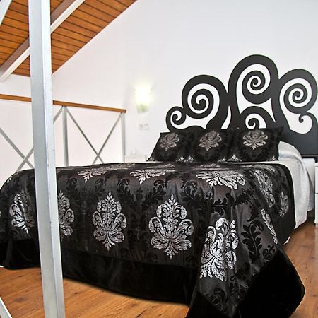 Apartamentos La Casa De La Alameda เมดินาซิโดเนีย ภายนอก รูปภาพ